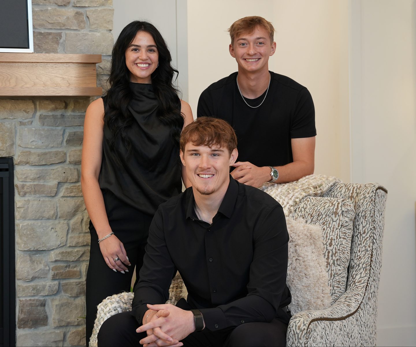 The Sutter Scales team in a model home living room